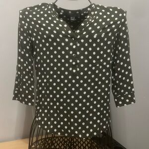 Green blouse with white polka dots